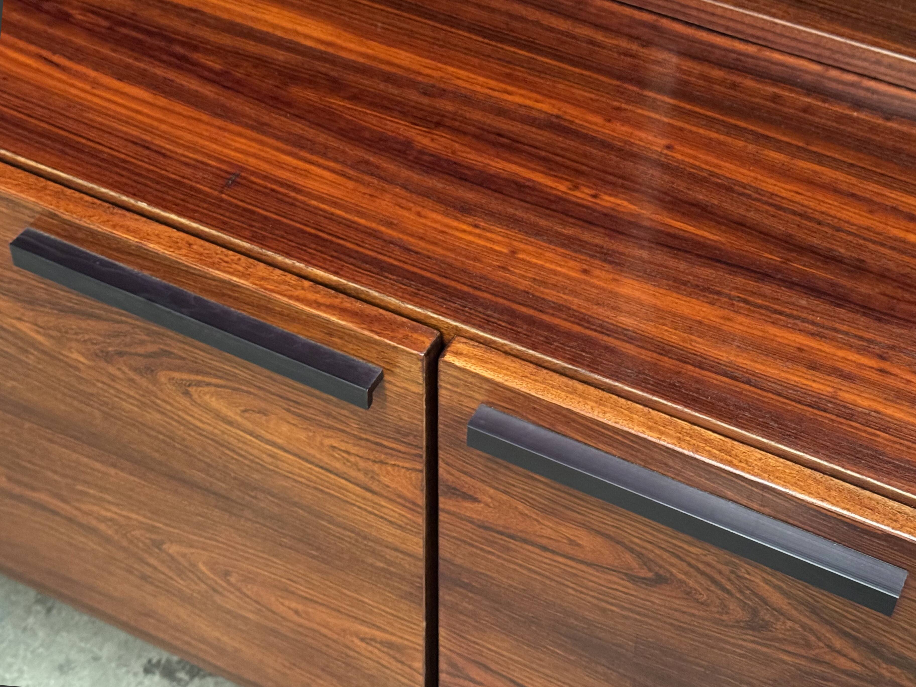 Scandinavian library in rosewood designed by Ib Kofod Larsen.