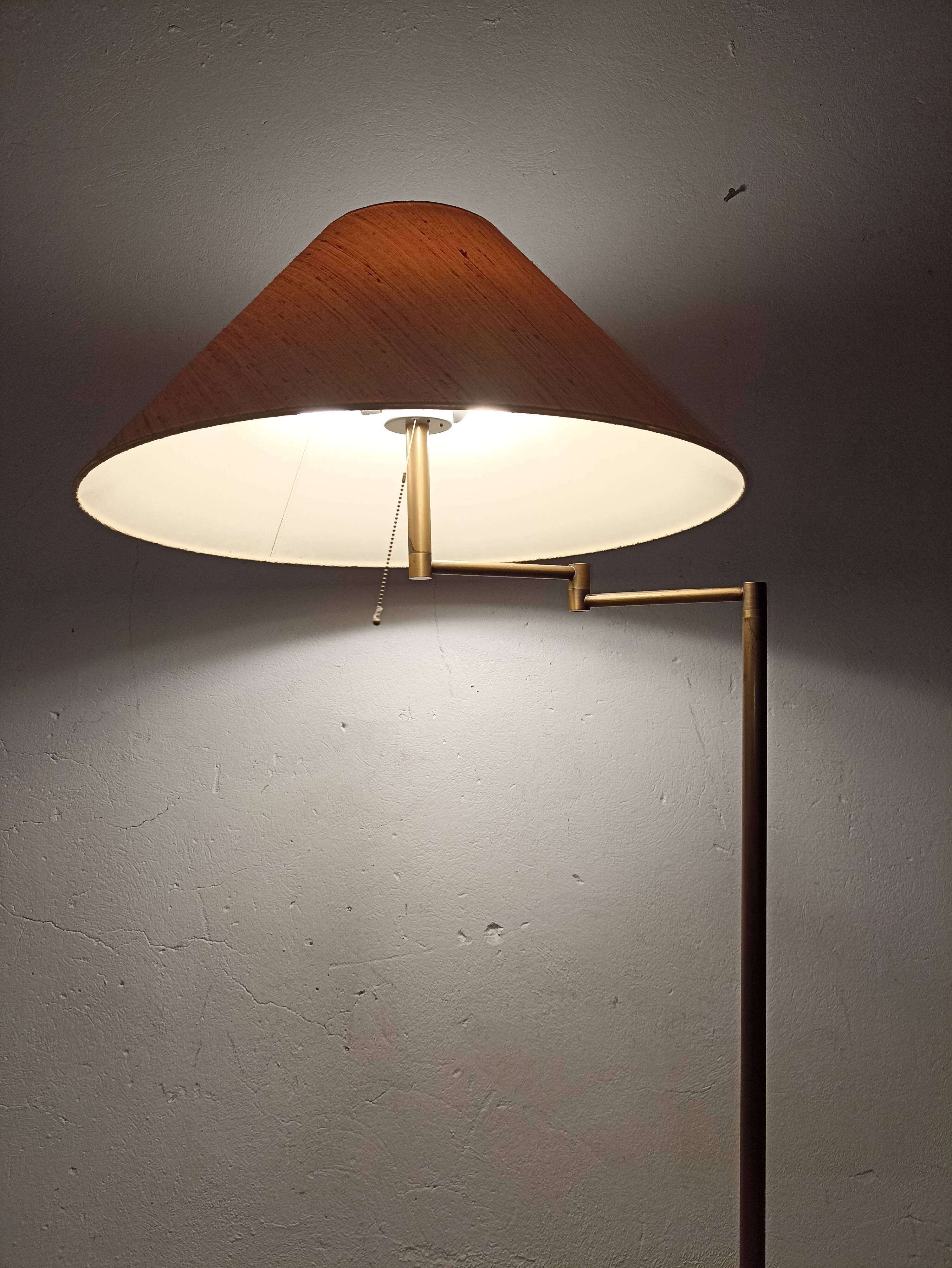 Brass articulated floor lamp
