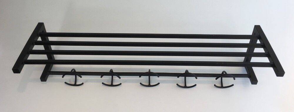 Designer coat rack in blackened metal
