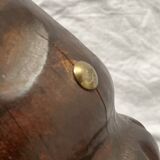 Old ashtray on carved wooden stand