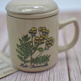 Vintage sandstone tisanière on the theme of chamomile botany