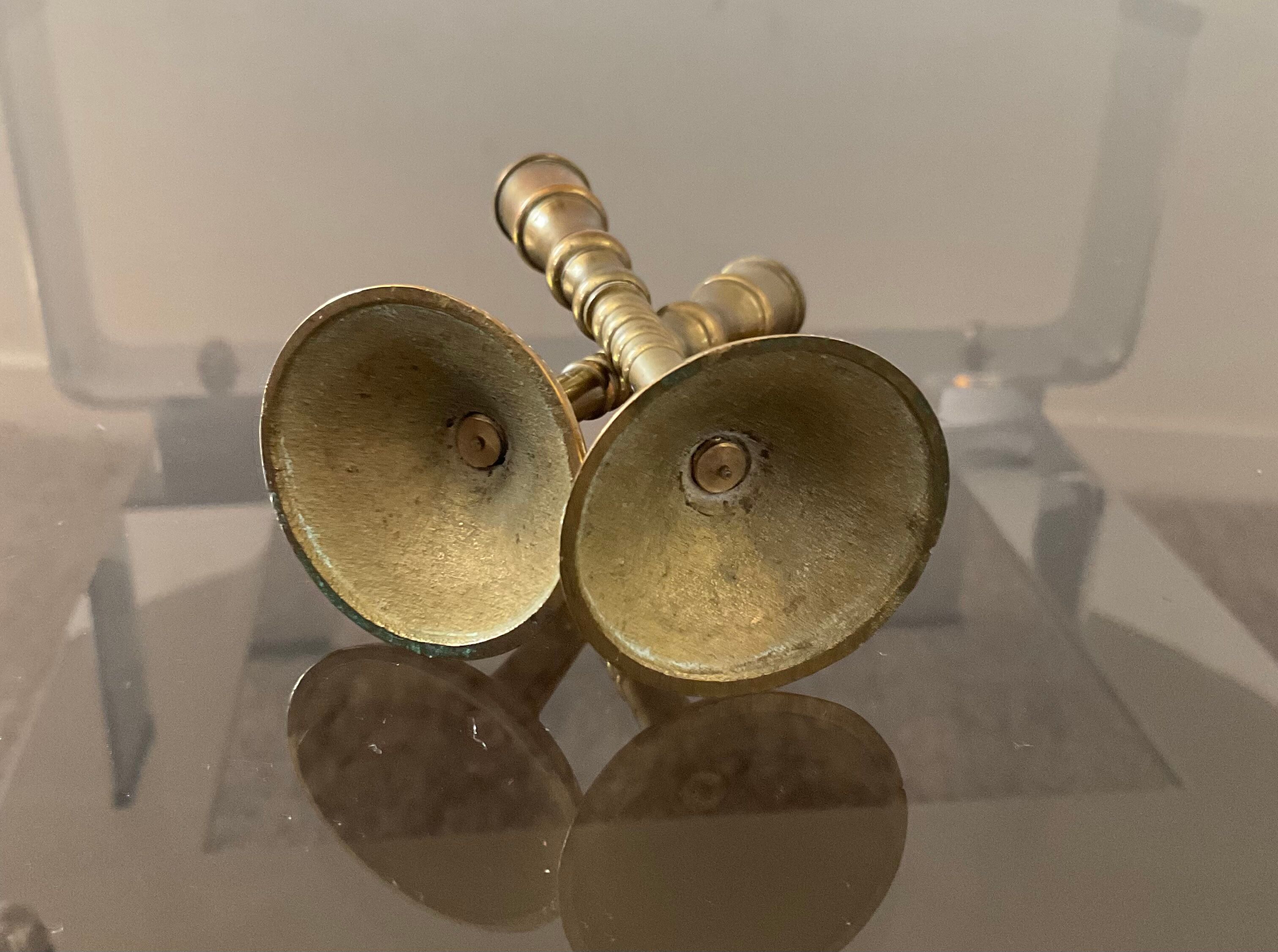Pair of miniature bronze torches