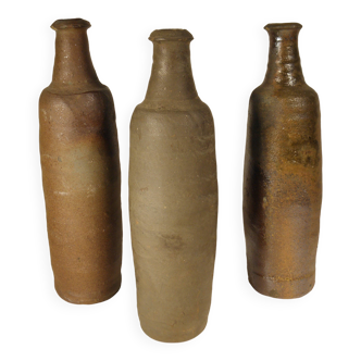 Lot de trois bouteilles anciennes en gres normand