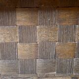 Square table in woven chestnut, with glass top