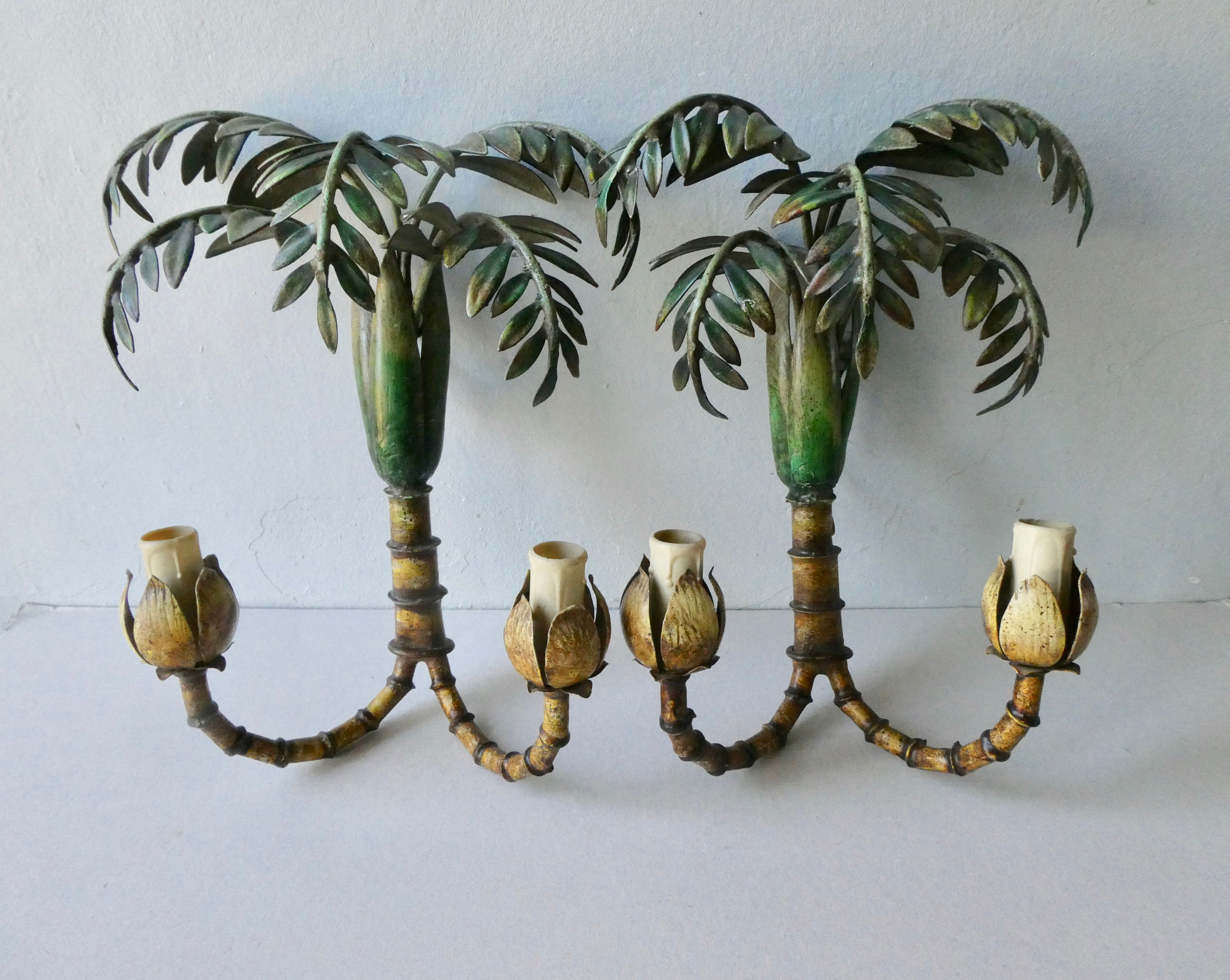 Pair of bamboo and palm sconces in metal