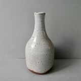 Sandstone vase bottle shaped by Norbert Pierlot in Ratilly
