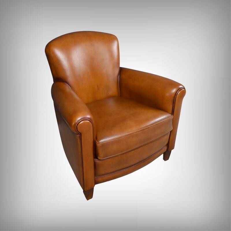 Paire de fauteuils club en cuir