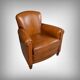 Paire de fauteuils club en cuir