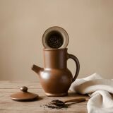 Handcrafted stoneware teapot with strainer