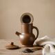Handcrafted stoneware teapot with strainer