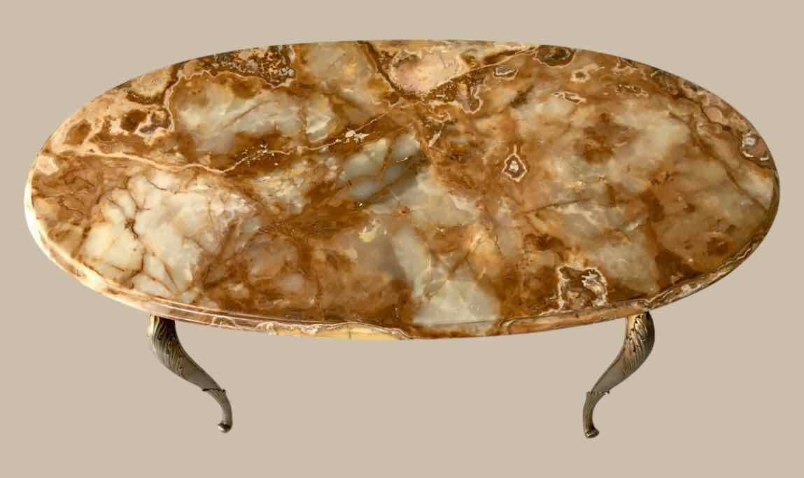 Oval coffee table in onyx and brass 1950