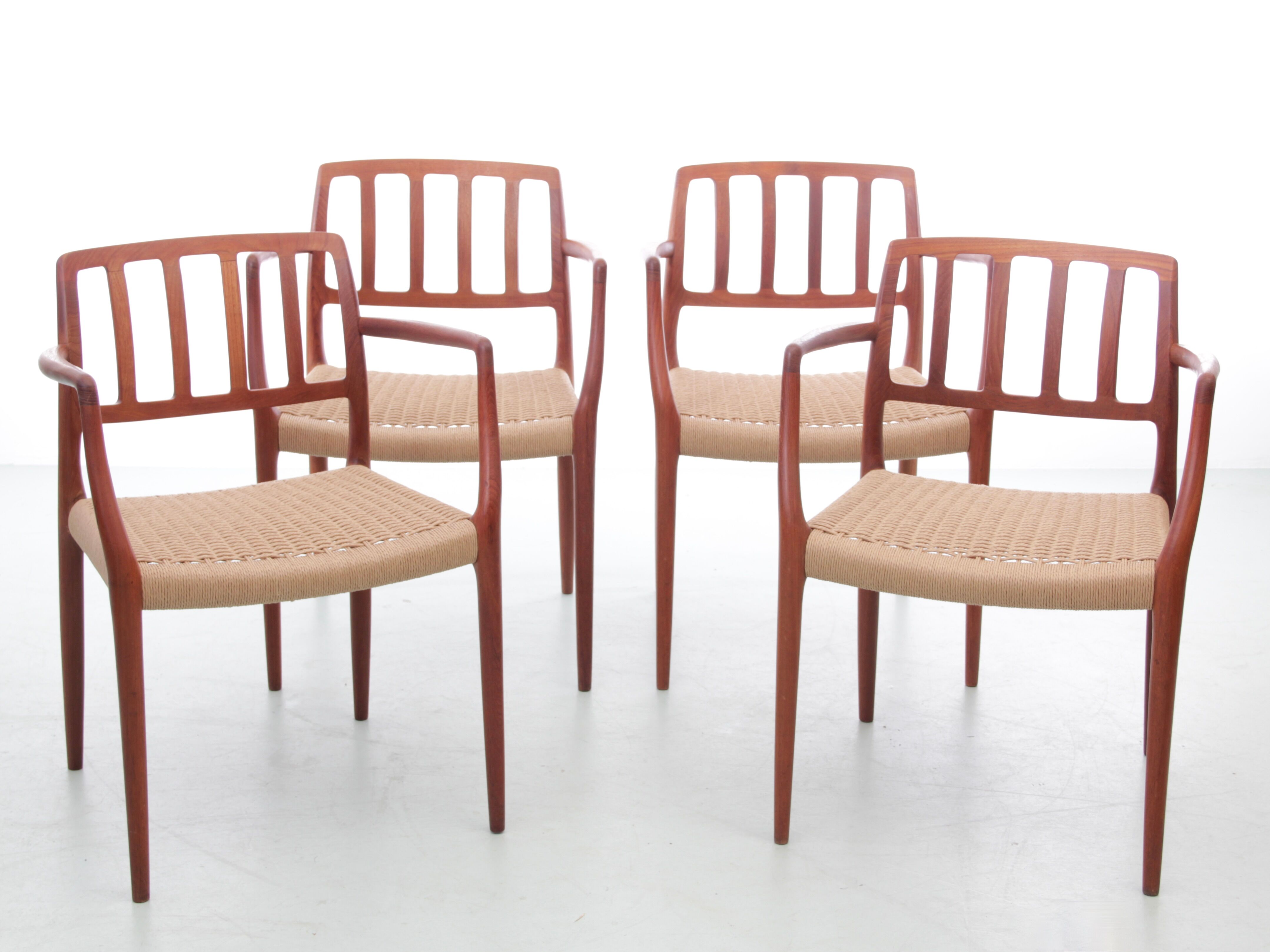 Suite of 4 Scandinavian teak armchairs model 66