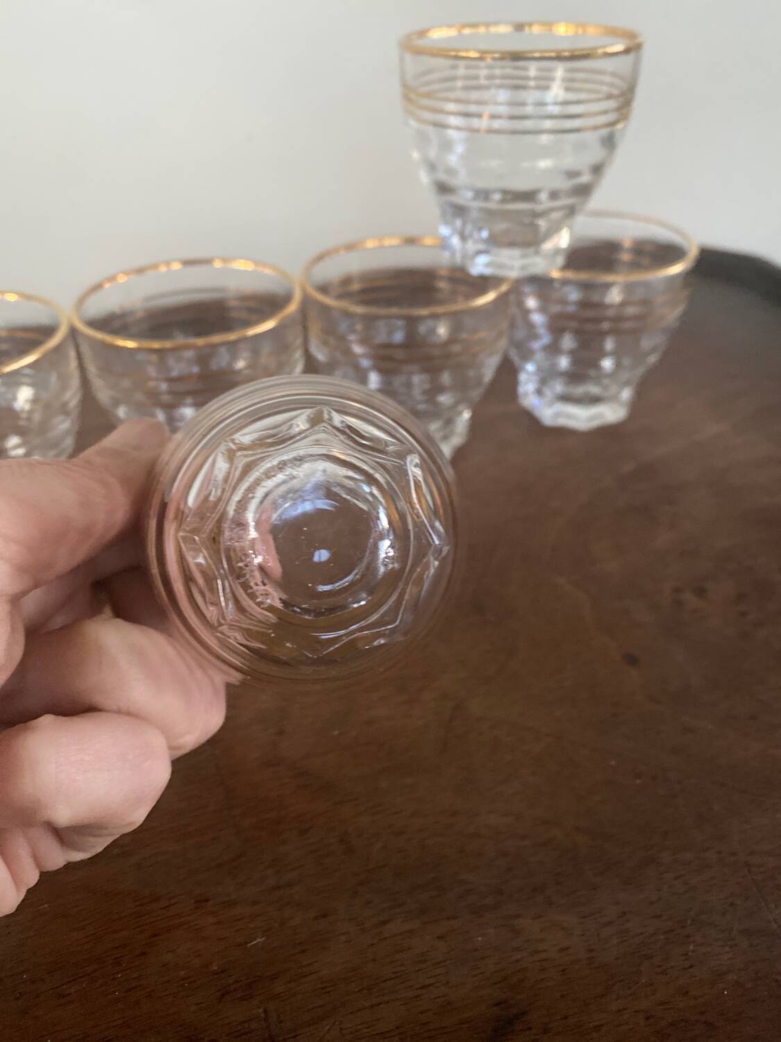 6 small golden glasses