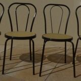 4 Chaises bistrot en métal noir et assise cannage plastique