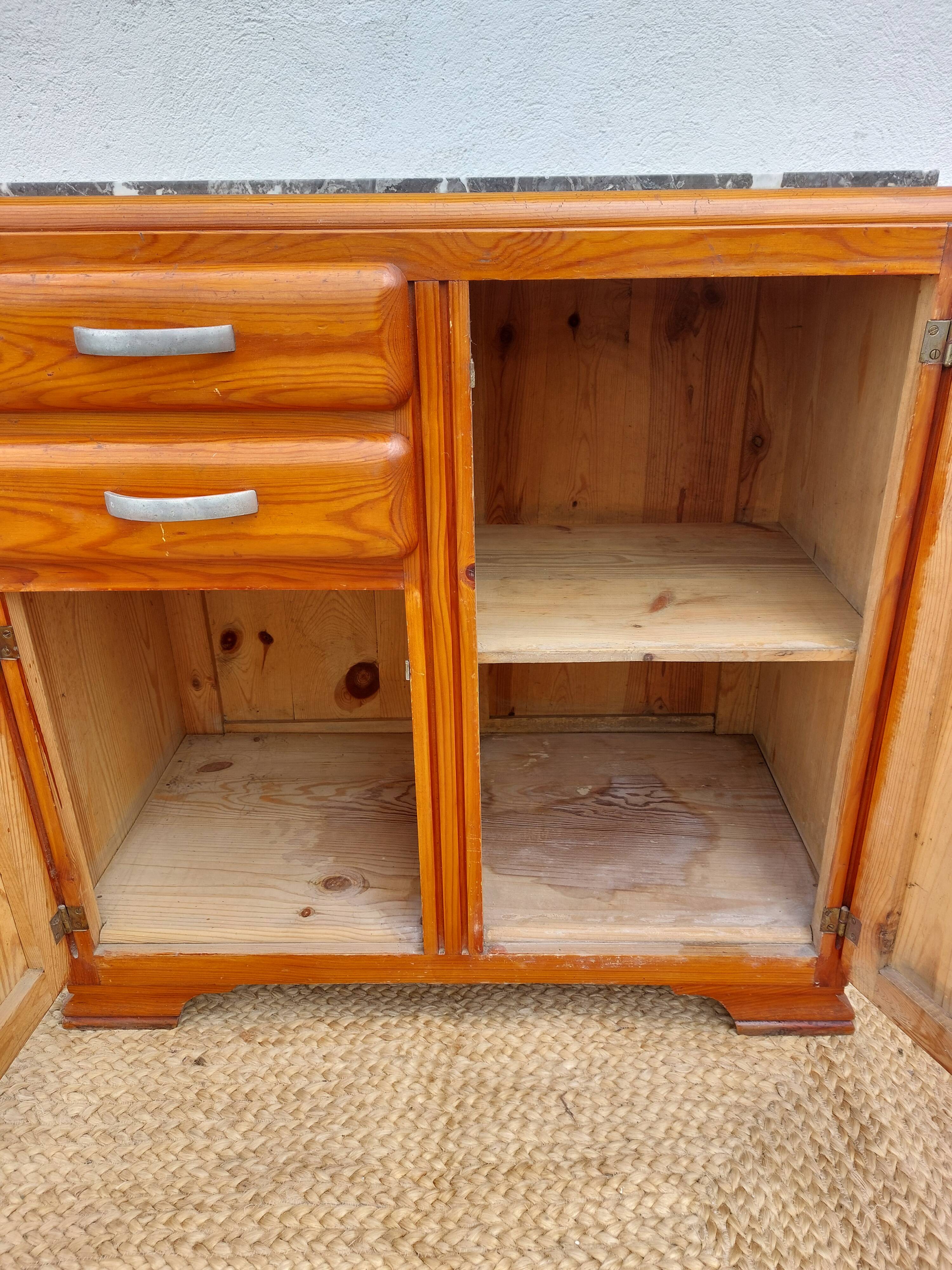 Mado buffet, marble top and asymmetrical doors.
