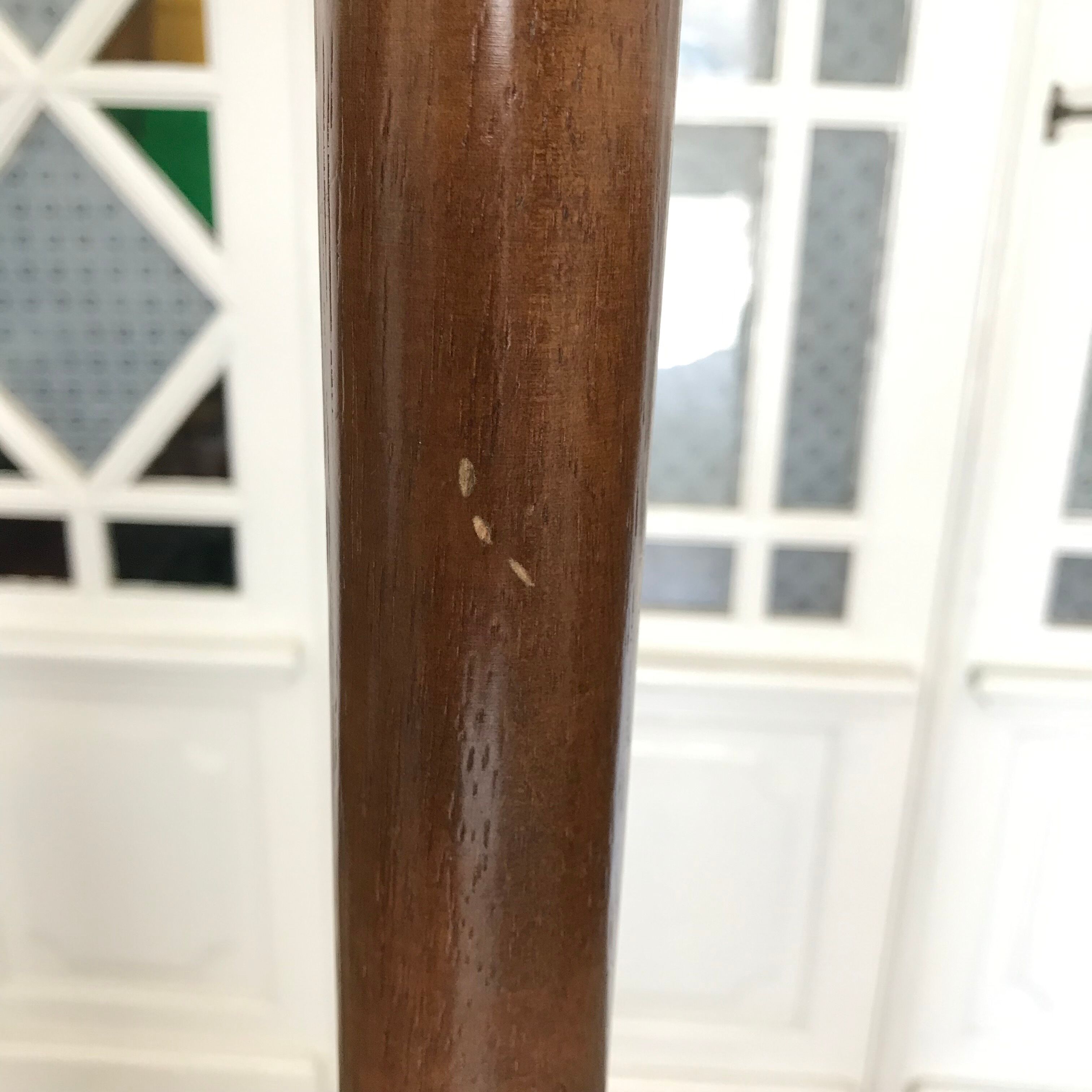 Wooden coat rack on foot