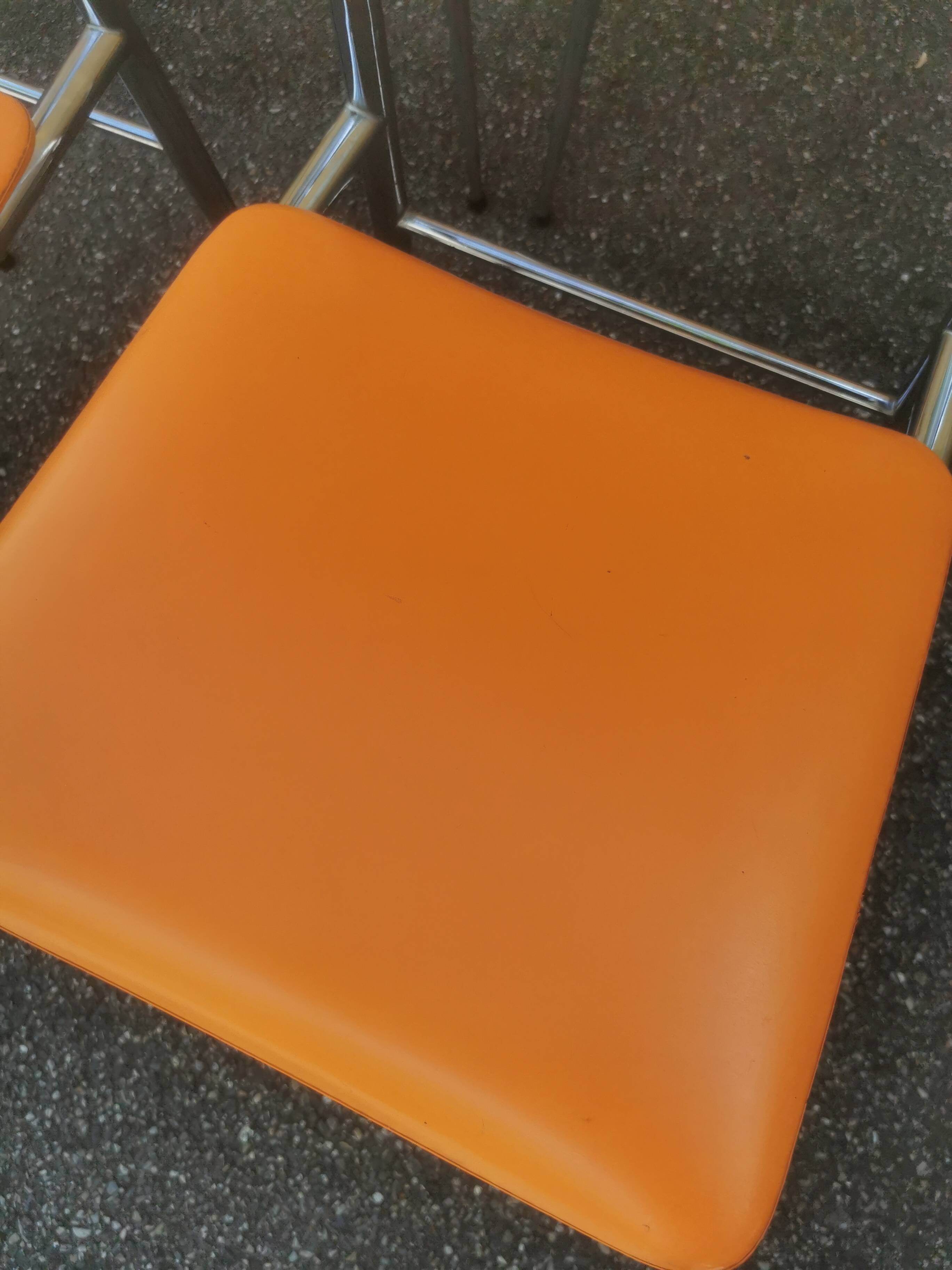 Tubmenager orange vintage chairs