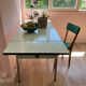 Green water Formica table with its 2 extensions.