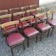 Lot de 12 chaises bistrot TON en bois et skaï rouge vintage.