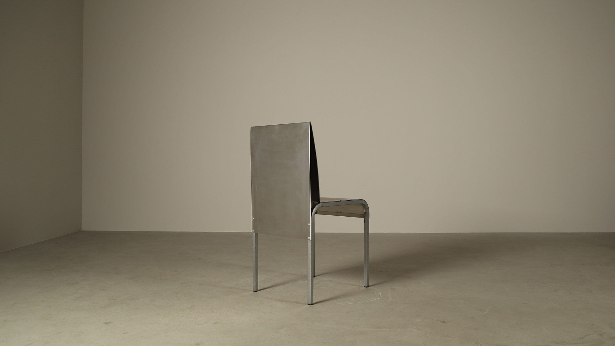 Set of six postmodernist stainless steel dining chairs from circa 1980-1990.