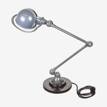 Jielde lamp on industrial metal base