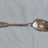Serving spoon, silver metal.