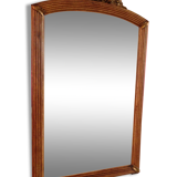 Mirror adorned with sculpted flowers