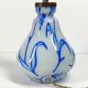 Antique table lamp in opaline glass with blue floral decoration.