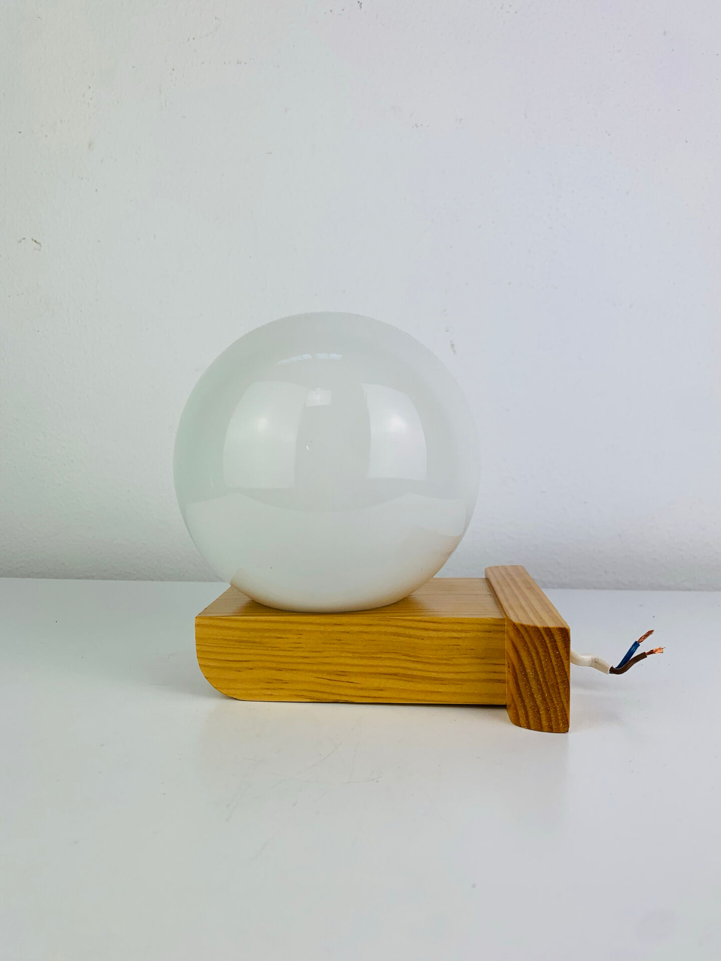 Vintage Tissot opaline globe and pin wall light.