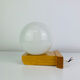 Vintage Tissot opaline globe and pin wall light.