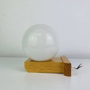 Vintage Tissot opaline globe and pin wall light.