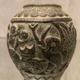 Terracotta vase with green digging patina with animal decoration