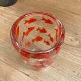 Glass vase with fish inclusions
