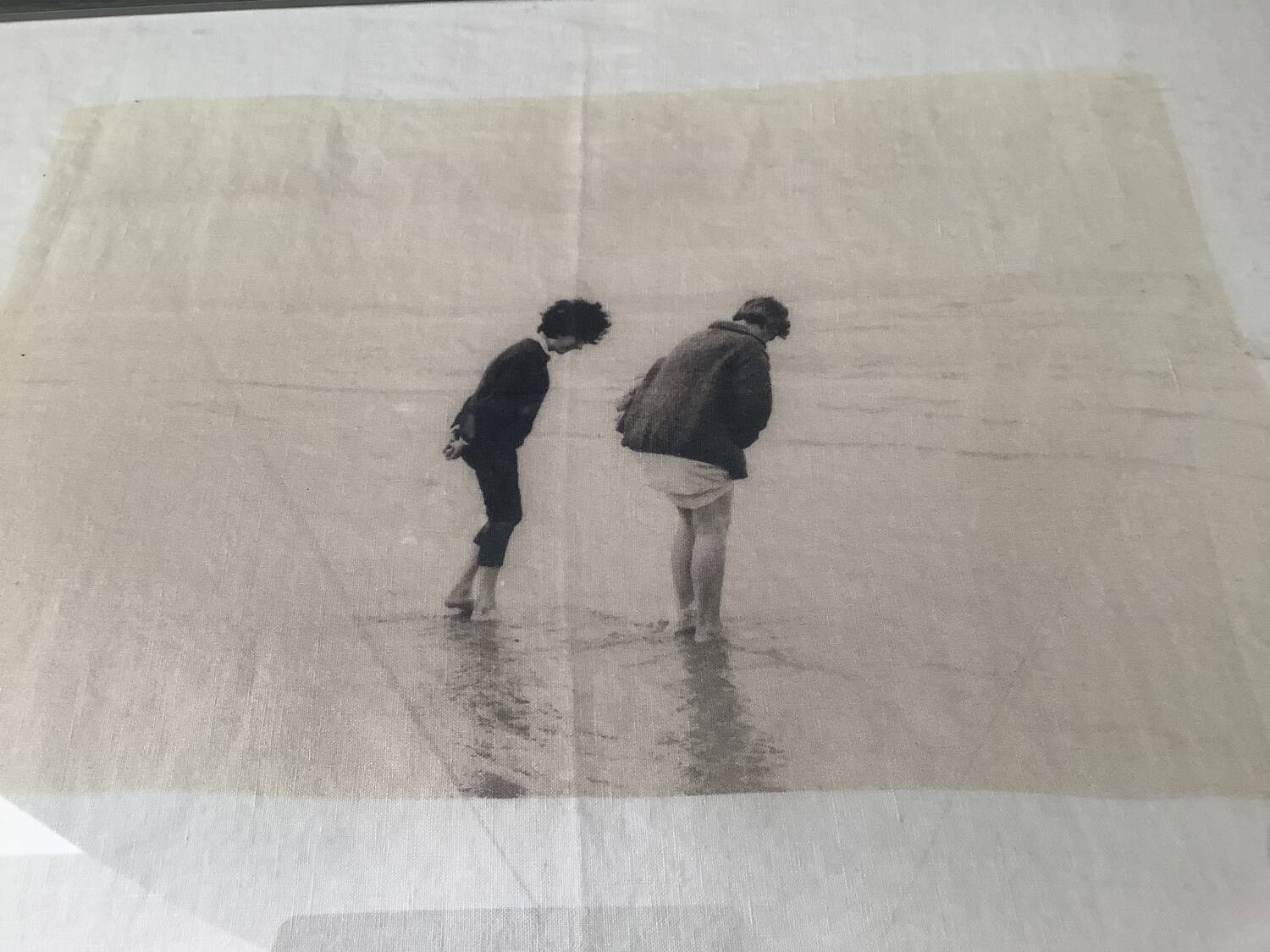 Black and white photo on fabric, framed