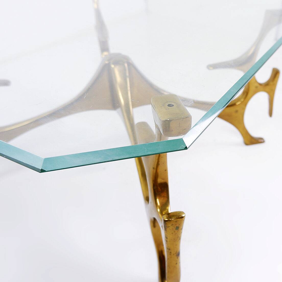 Sculptural coffee table in the style of Fred Brouard