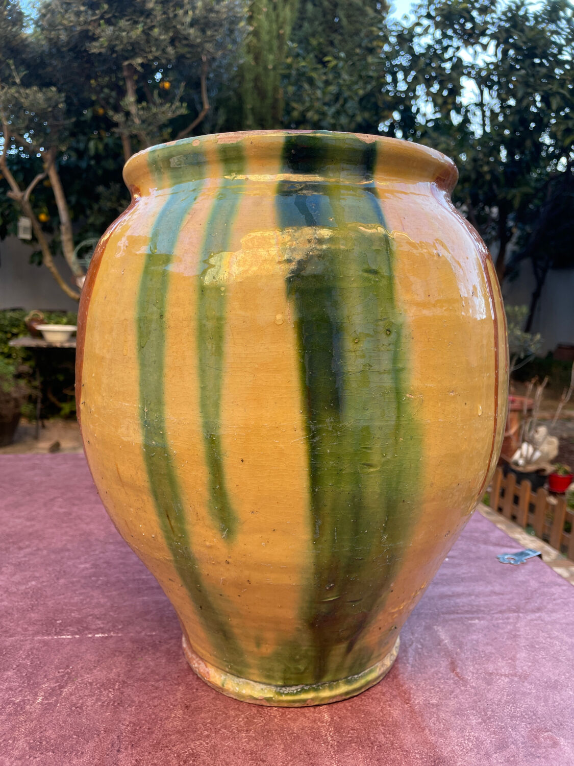 Old glazed terracotta jar