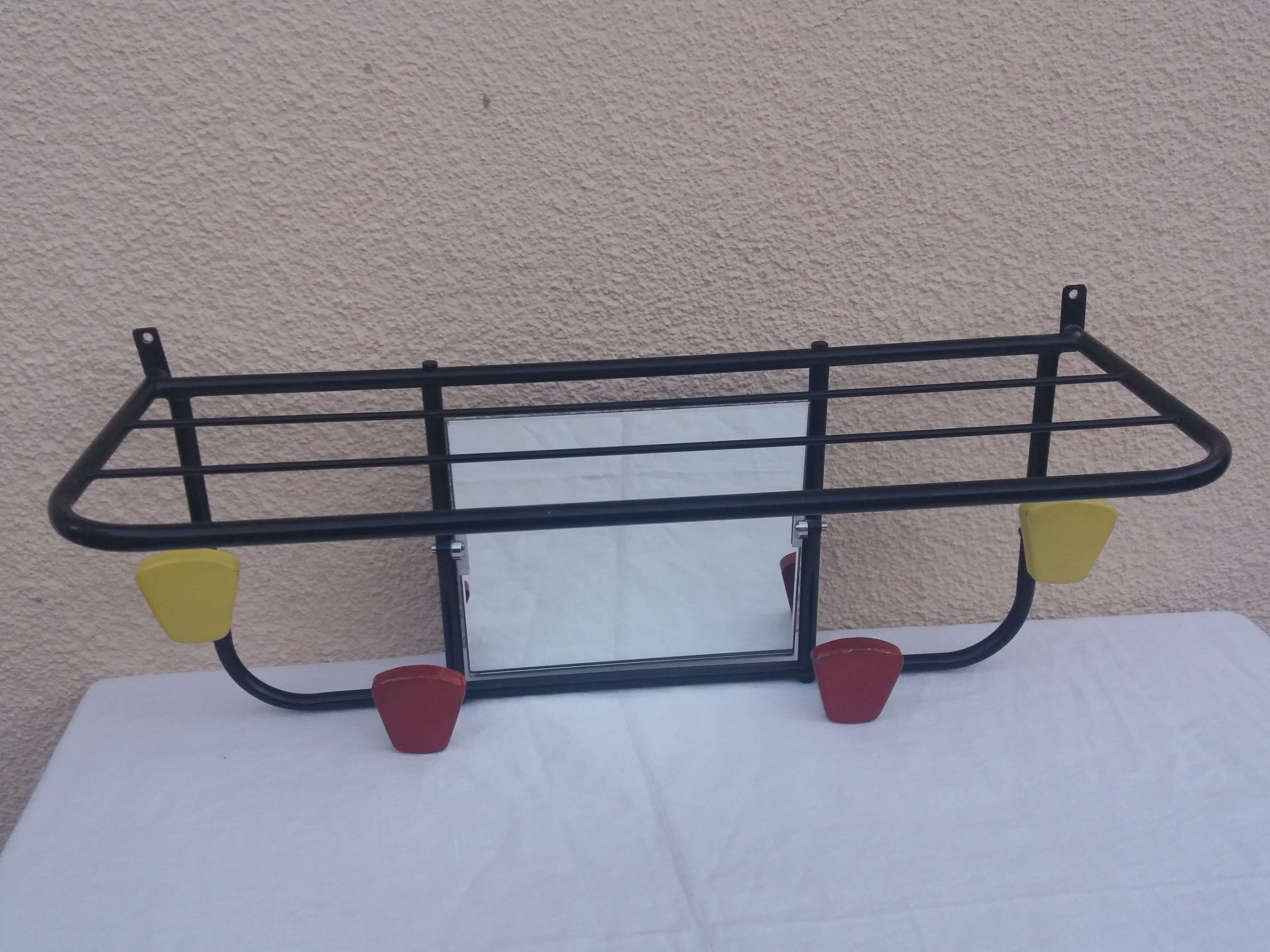 Wall coat holder with mirror