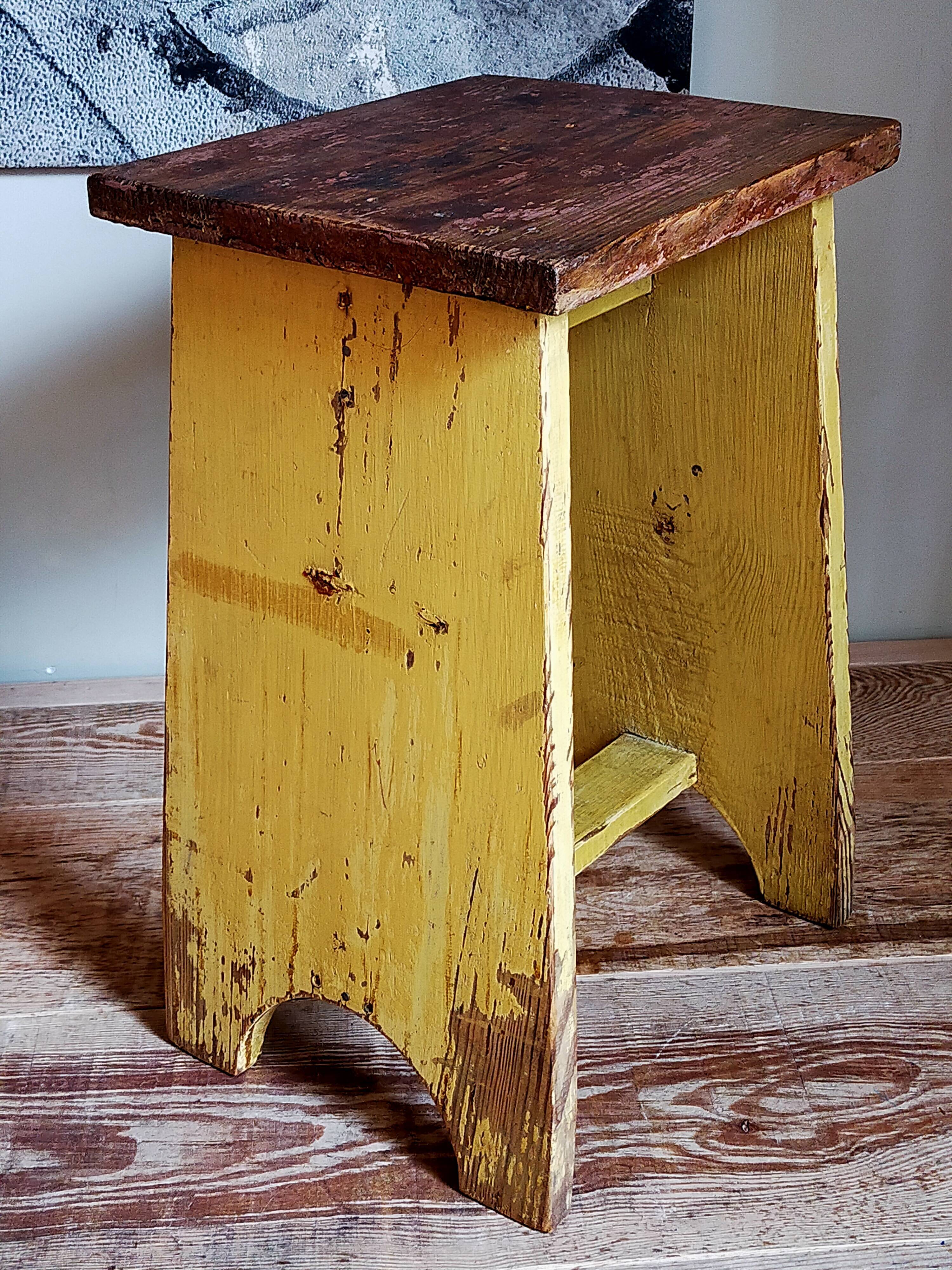 Art-populaire workshop stool in patinated wood