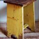 Art-populaire workshop stool in patinated wood