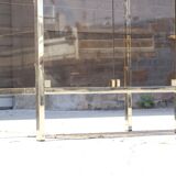 Post-modern low window in brass and smoked glass, 1970s