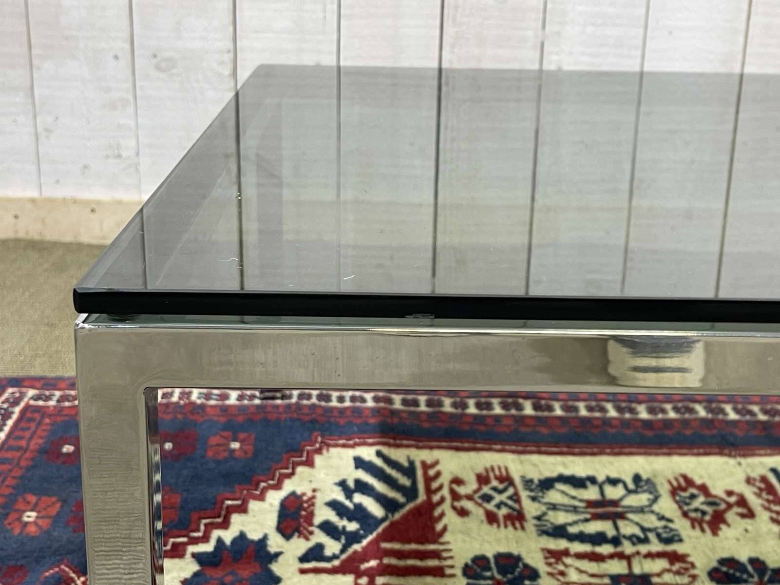 Chrome coffee table with a glass top from the 1980s.