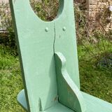 Old curved wooden farm bench