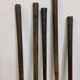 Old golf bag with 5 golf clubs