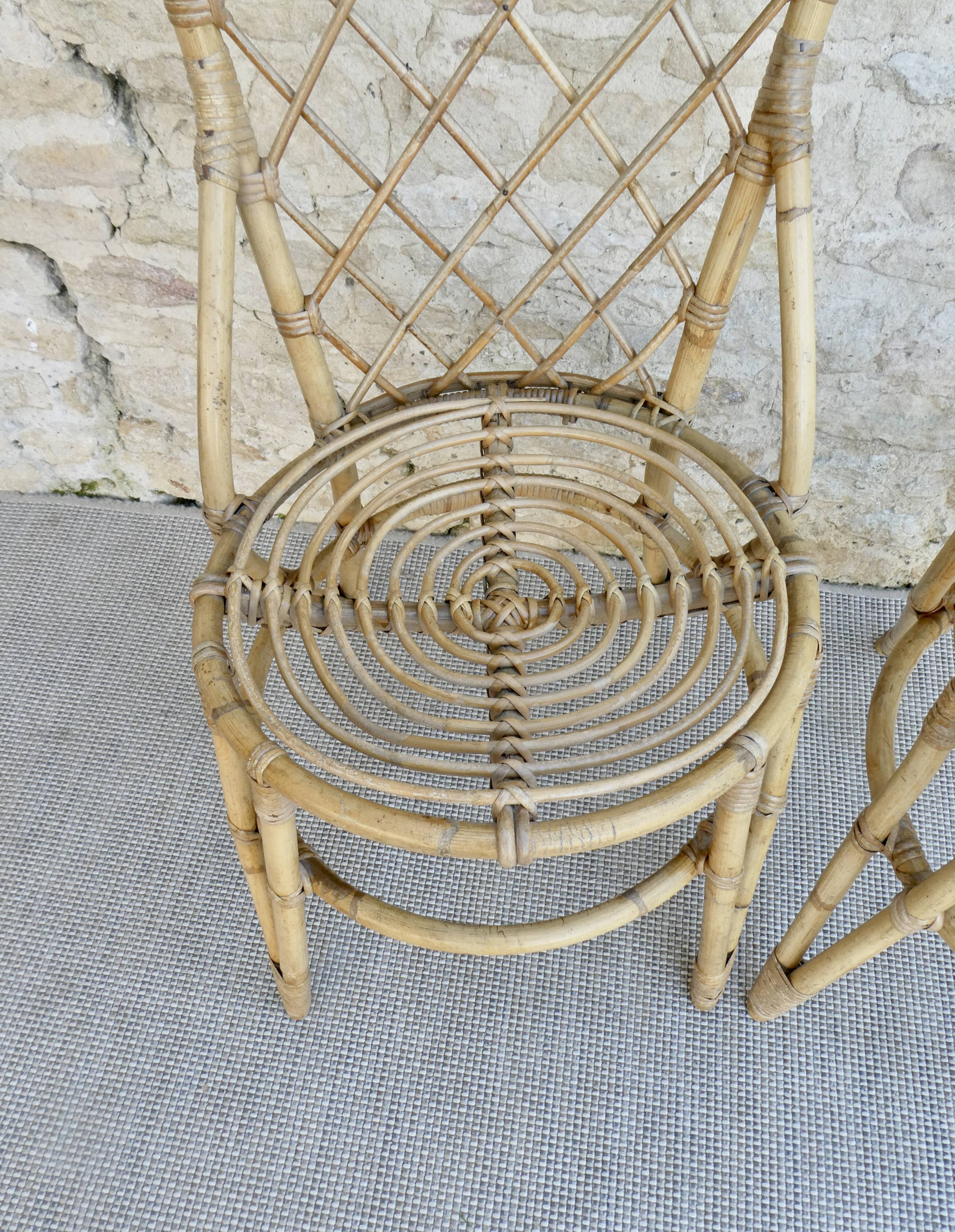 Paire de chaises en rotin Louis Sognot