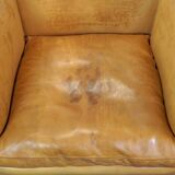 Ensemble ancien unique composé de 2 fauteuils club et d'un canapé en cuir couleur cognac à roulettes