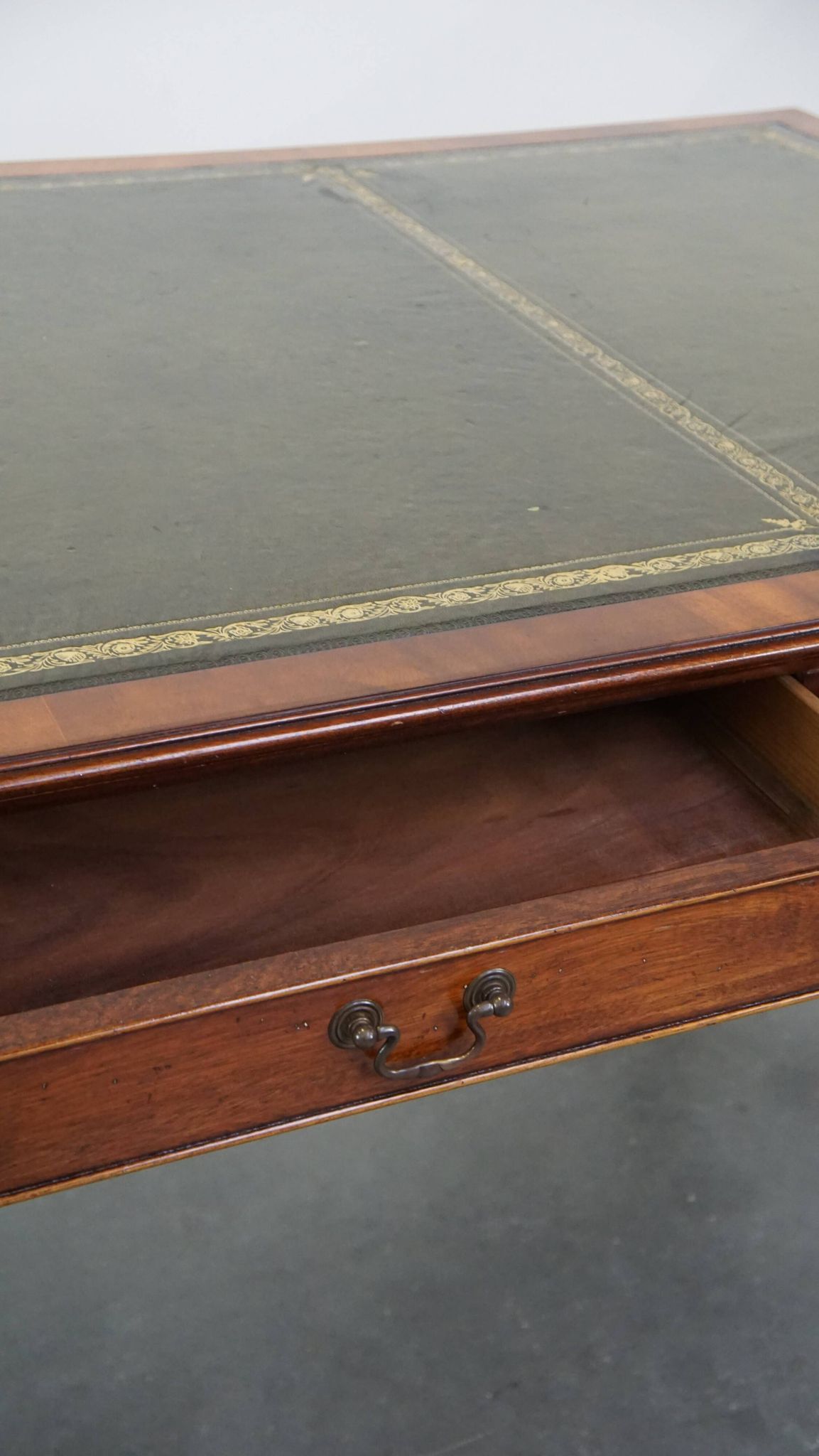 Large writing desk with green leather top, elegant legs and 3 English style drawers
