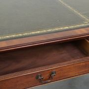 Large writing desk with green leather top, elegant legs and 3 English style drawers