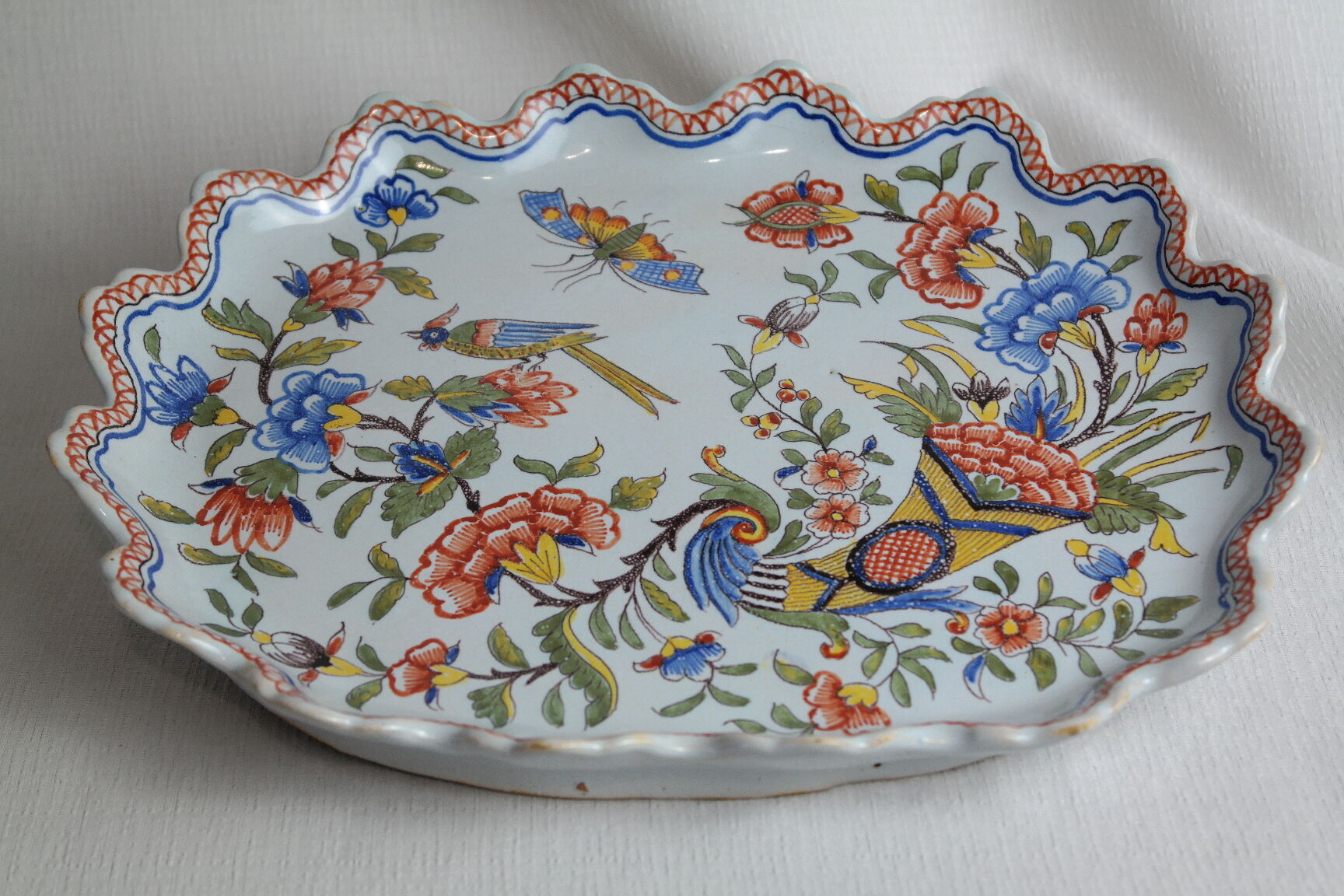 Flat earthenware of Rouen polychrome decoration cornucopia of plenty