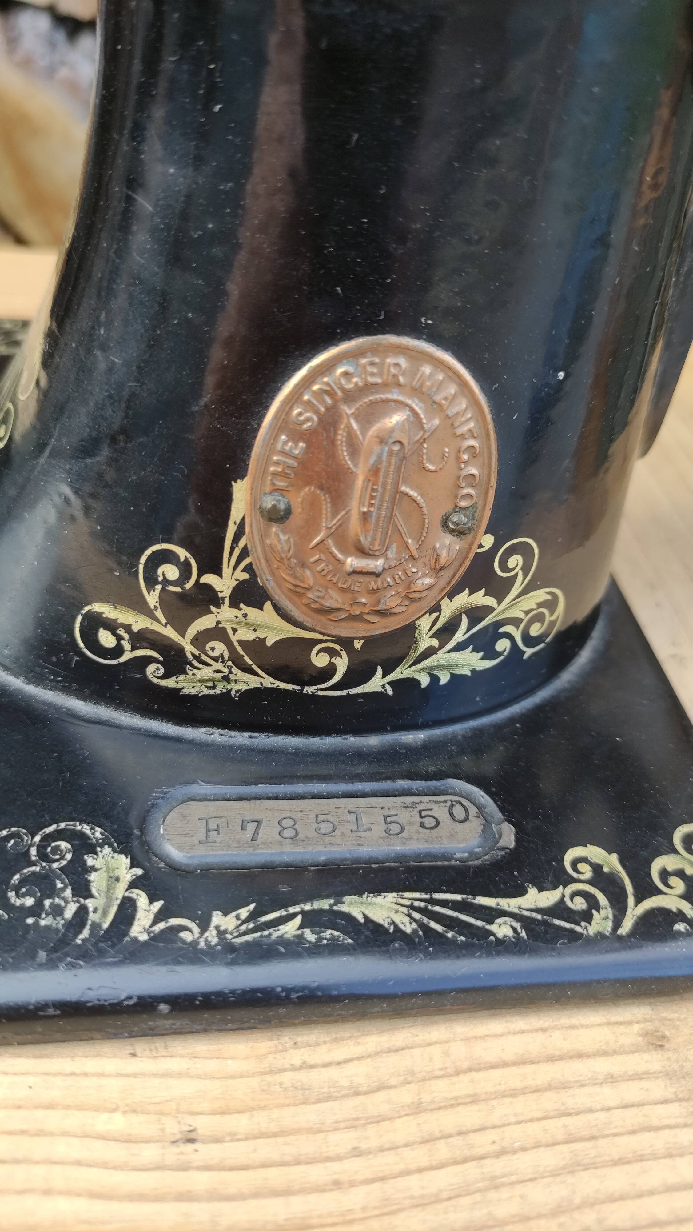 Old Singer sewing machine on pedestal