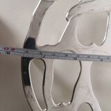 silver-plated metal strawberry-shaped trivet